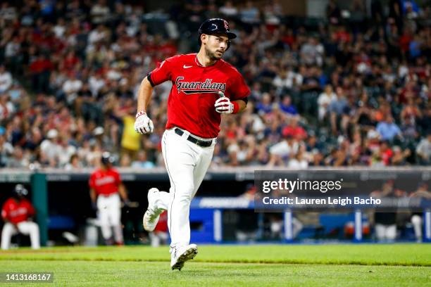 Luke Maile of the Cleveland Guardians hits an RBI single in the bottom of the seventh inning at Progressive Field on August 5, 2022 in Cleveland,...