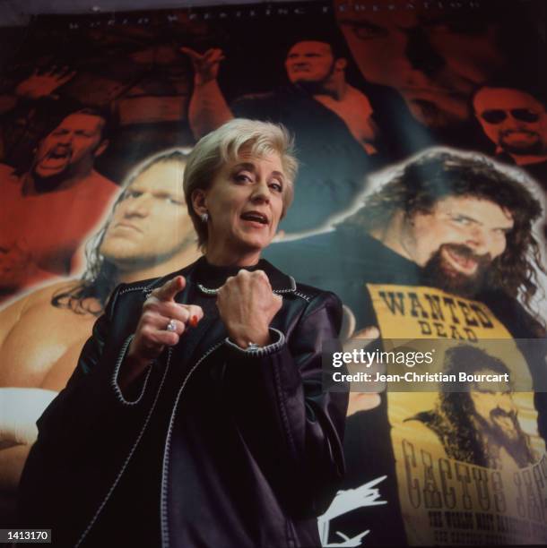 Linda McMahon, President and CEO of the World Wrestling Federation, poses for a portrait with the federation posters in the background December...