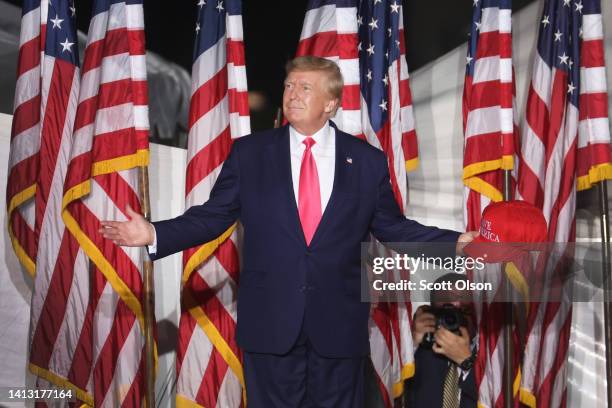 Former President Donald Trump greets supporters during a rally on August 05, 2022 in Waukesha, Wisconsin. Former President Trump endorsed Republican...