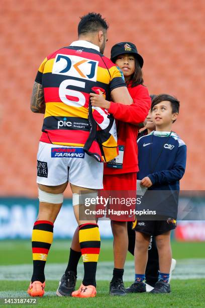 Liam Messam of Waikato greets his sons as he starts his 100th game during the round one Bunnings NPC match between Waikato and Hawke's Bay at FMG...