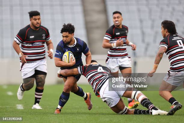 Wiseguy Faiane of Ponsonby is tackled during the Gallaher Shield Final match between Ponsonby and Manukau at Eden Park on August 06, 2022 in...