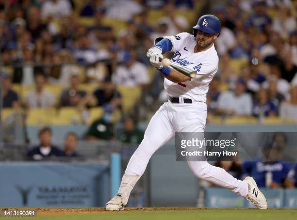 Joey Gallo of the Los Angeles Dodgers singles during the eighth inning against the San Diego Padres at Dodger Stadium on August 05, 2022 in Los...