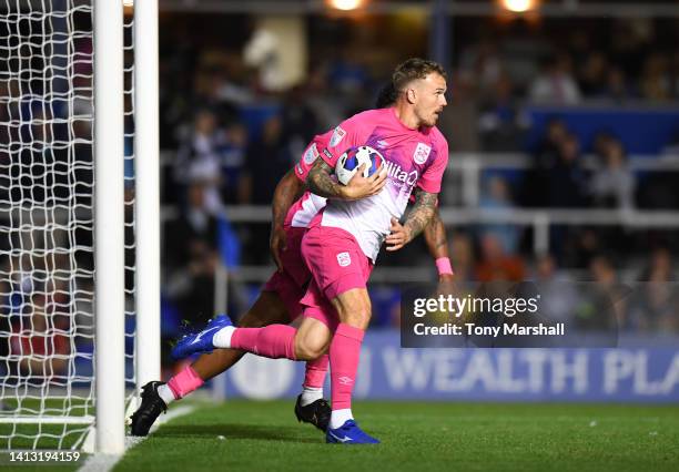 Danny Ward of Huddersfield Town celebrates with the ball after scoring the first goal of his team during the Sky Bet Championship between Birmingham...