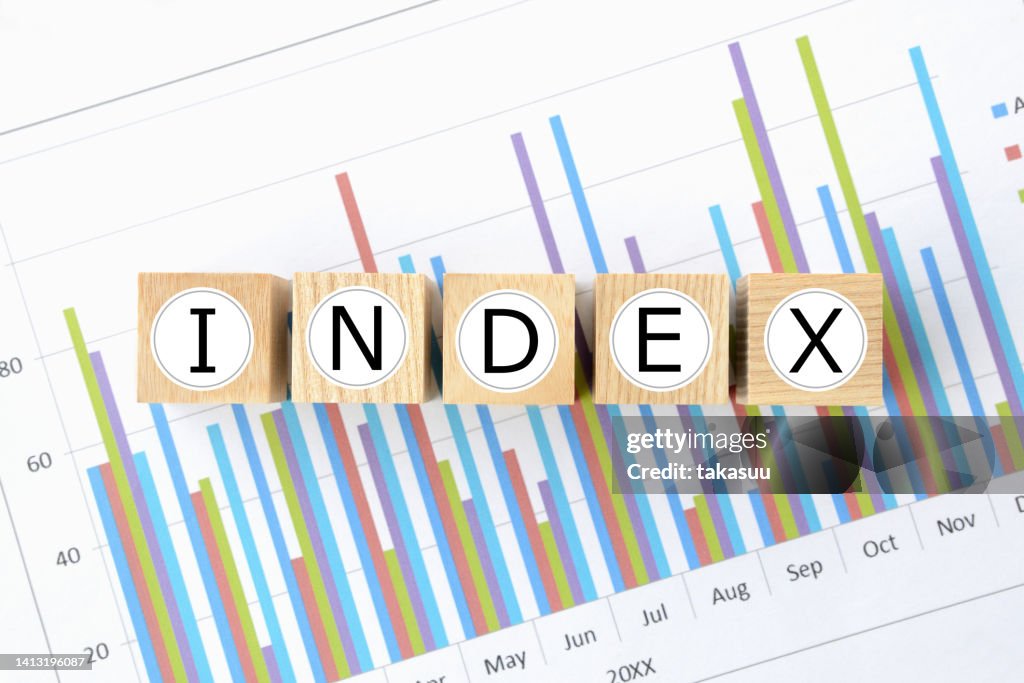 Wooden blocks with "INDEX" word on business chart