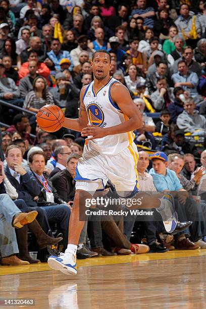 Dominic McGuire of the Golden State Warriors dribbles the ball up the court in a game against the Dallas Mavericks on March 10, 2012 at Oracle Arena...