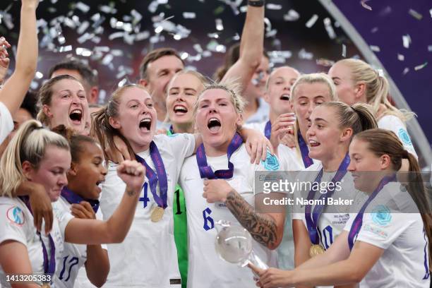 England celebrates with the trophy during the victory ceremony during the UEFA Women's Euro 2022 final match between England and Germany at Wembley...