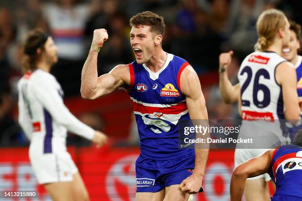 Josh Dunkley of the Bulldogs celebrates kicking a goal during the round 21 AFL match between the Western Bulldogs and the Fremantle Dockers at Marvel...