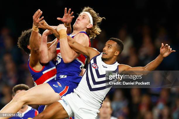 Aaron Naughton of the Bulldogs attempts to mark the ball during the round 21 AFL match between the Western Bulldogs and the Fremantle Dockers at...