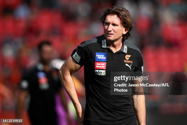 James Hird assistant coach of the Giants look on ahead of the round 21 AFL match between the Greater Western Sydney Giants and the Essendon Bombers...