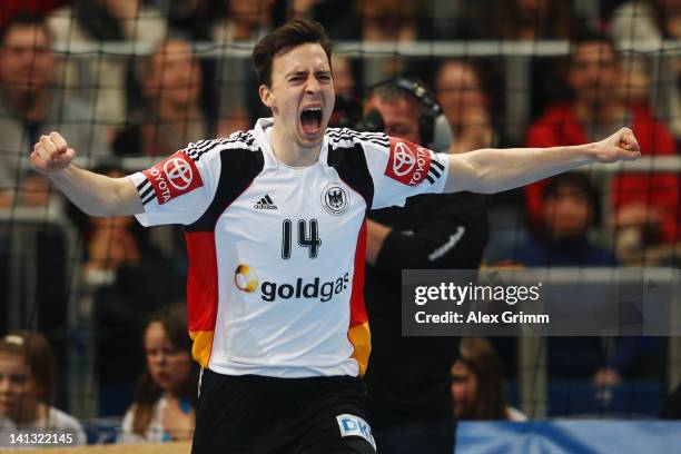 Patrick Groetzki of Germany celebrates a goal during the international Handball friendly match between Germany and Iceland at SAP Arena on March 14,...