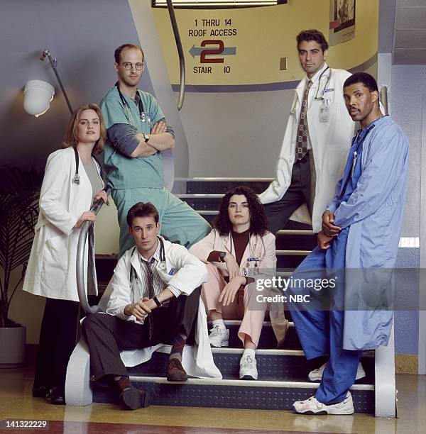 Season 1 -- Pictured: Sherry Stringfield as Doctor Susan Lewis, Anthony Edwards as Doctor Mark Greene, George Clooney as Doctor Doug Ross, Eriq La...