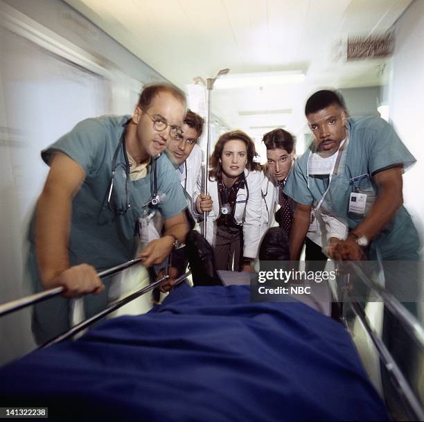 Season 1 -- Pictured: Anthony Edwards as Doctor Mark Greene, George Clooney as Doctor Doug Ross, Sherry Stringfield as Doctor Susan Lewis, Noah Wyle...