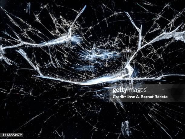 screen of a mobile phone with broken glass. - cracked iphone stock pictures, royalty-free photos & images