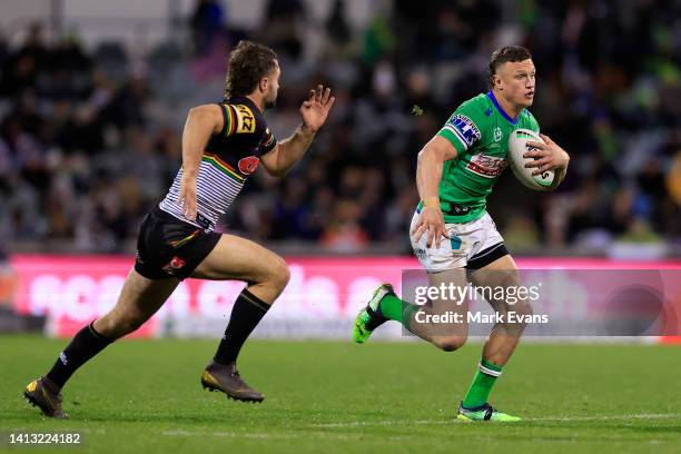 Jack Wighton of the Raiders runs with the ball during the round 21 NRL match between the Canberra Raiders and the Penrith Panthers at GIO Stadium, on...