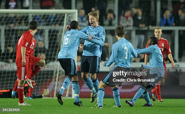 Vitkor Fischer of Ajax celebrates scoring the opening goal with teammates during the NextGen Series Semi-Final match between Liverpool U19 and Ajax...