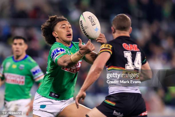 Ata Mariota of the Raiders catches the ball during the round 21 NRL match between the Canberra Raiders and the Penrith Panthers at GIO Stadium, on...