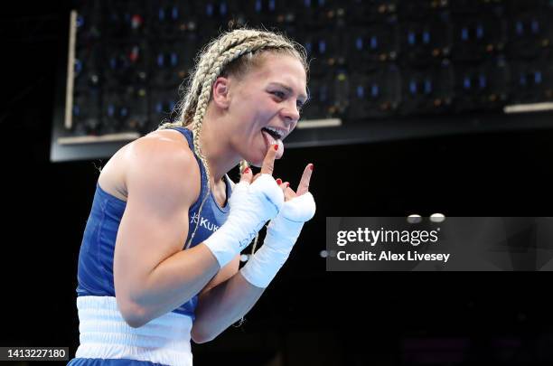 Demie-Jade Resztan of Team England celebrates victory over Lethabo Bokamoso Modukanele of Team Botswana following the Women’s Over 45kg-48kg -...