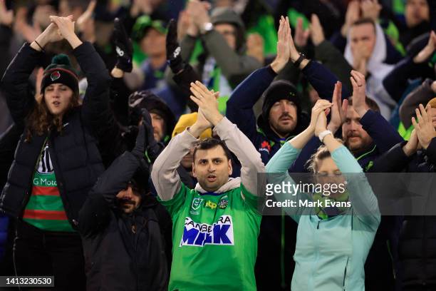 Raiders fans peform the Viking Clap during the round 21 NRL match between the Canberra Raiders and the Penrith Panthers at GIO Stadium, on August 06...