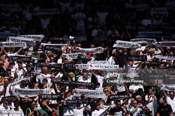 Fulham Fans show their support as the team walk out prior to the Premier League match between Fulham FC and Liverpool FC at Craven Cottage on August...