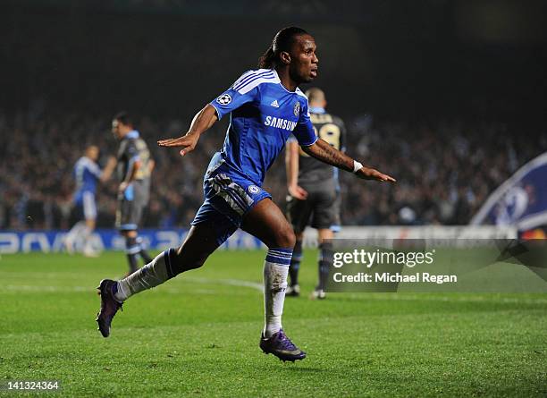 Didier Drogba of Chelsea celebrates as he scores their first goal with a header during the UEFA Champions League Round of 16 second leg match between...