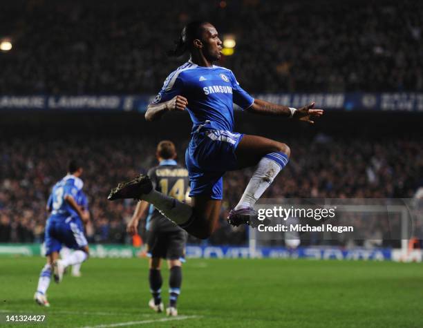 Didier Drogba of Chelsea celebrates as he scores their first goal with a header during the UEFA Champions League Round of 16 second leg match between...