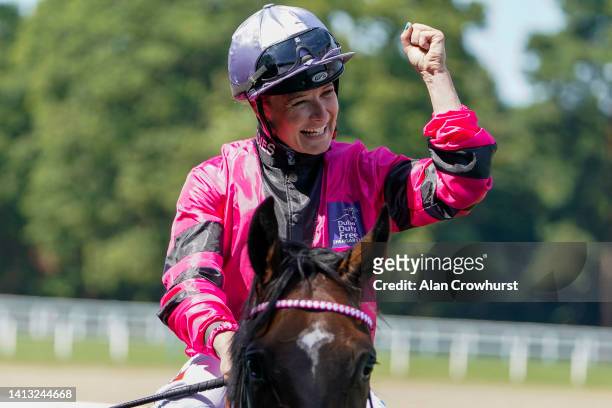 Joanna Mason celebrates victory after riding Amanzoe to win The Dubai Duty Free Shergar Cup Curtain Raiser Classified Stakes during The Shergar Cup...