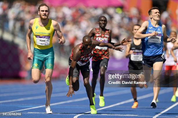 Oliver Hoare of Team Australia, Timothy Cheruiyot of Team Kenya and Jake Wightman of Team Scotland compete during the Men's 1500m Final on day nine...
