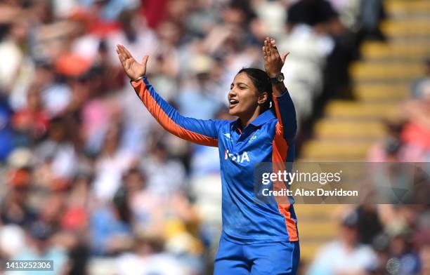 Sneh Rana of Team India celebrates the wicket of Katherine Brunt of Team England during the Cricket T20 - Semi-Final match between Team England and...