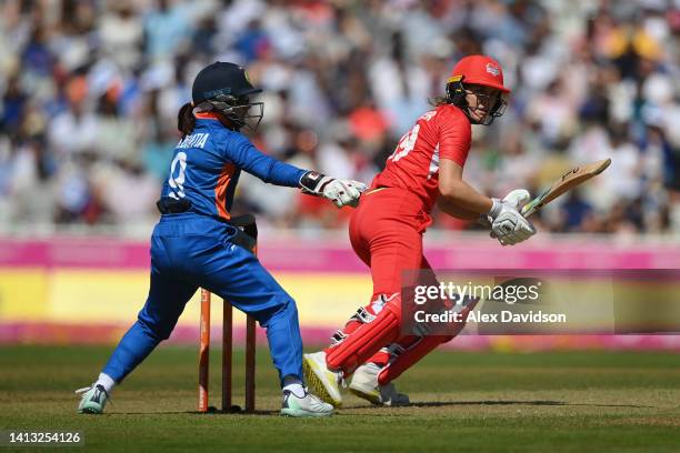 Nat Sciver of Team England hits runs during the Cricket T20 - Semi-Final match between Team England and Team India on day nine of the Birmingham 2022...