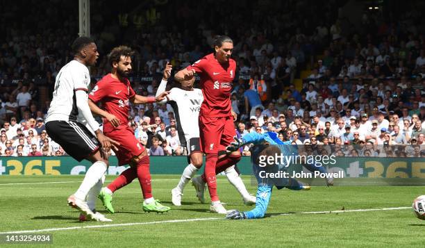 Mohamed Salah of Liverpool scores the second goal making the score 2- during the Premier League match between Fulham FC and Liverpool FC at Craven...
