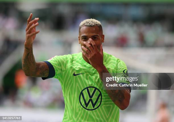 Lukas Nmecha of VfL Wolfsburg celebrates scoring their side's first goal during the Bundesliga match between VfL Wolfsburg and SV Werder Bremen at...