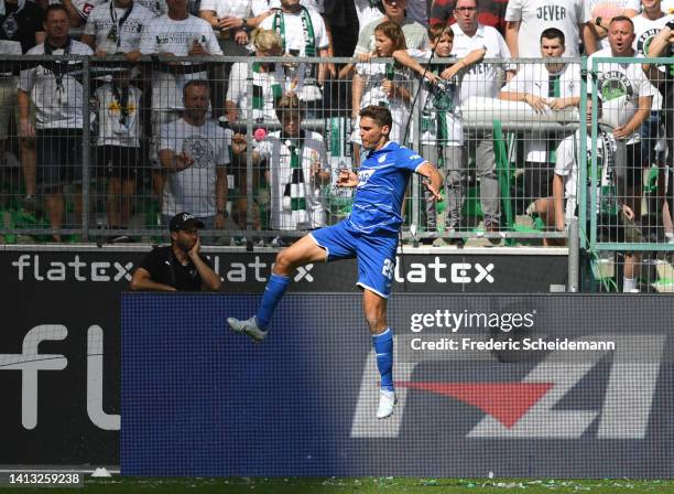 Robert Skov of TSG 1899 Hoffenheim celebrates scoring their side's first goal during the Bundesliga match between Borussia Mönchengladbach and TSG...