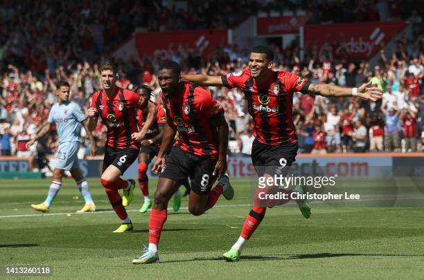 Jefferson Lerma of AFC Bournemouth celebrates their side's first goal with teammate Dominic Solanke during the Premier League match between AFC...