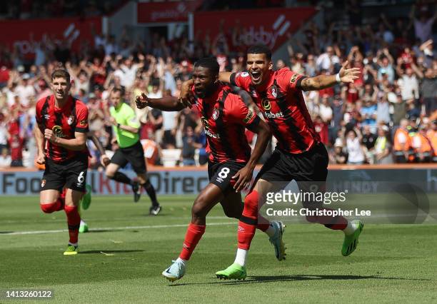 Jefferson Lerma of AFC Bournemouth celebrates their side's first goal with teammate Dominic Solanke during the Premier League match between AFC...