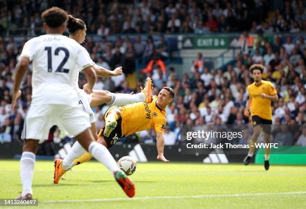 Daniel Podence of Wolverhampton Wanderers scores their side's first goal during the Premier League match between Leeds United and Wolverhampton...