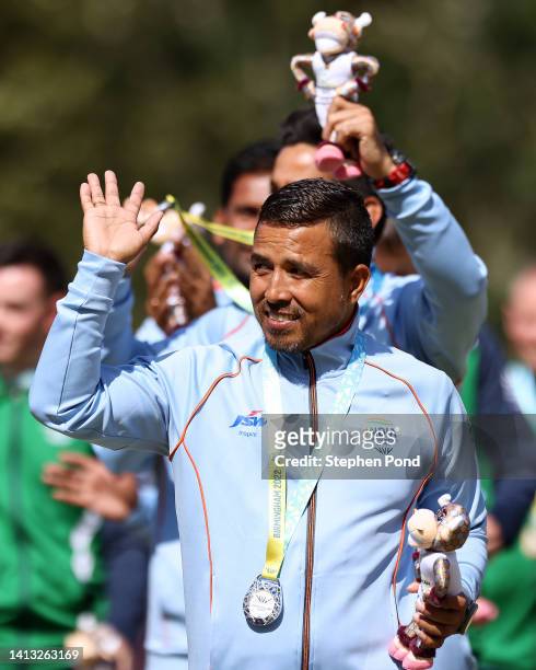 Silver medalist Sunil Bahadur of Team India poses on the podium during Men's Fours Lawn Bowls - medal ceremony on day nine of the Birmingham 2022...
