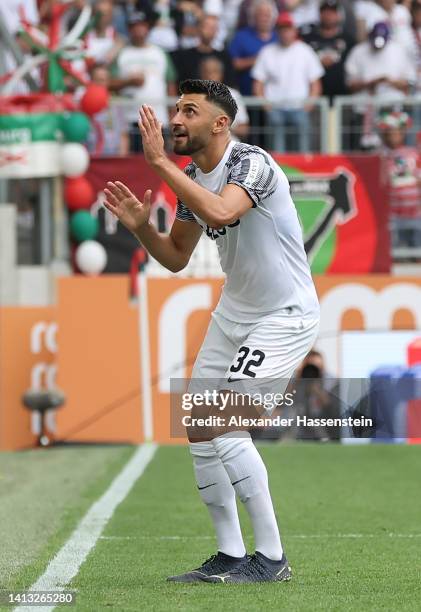 Vincenzo Grifo of SC Freiburg celebrates scoring their side's second goal during the Bundesliga match between FC Augsburg and Sport-Club Freiburg at...