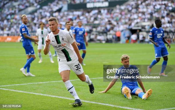 Nico Elvedi of Borussia Monchengladbach celebrates scoring their side's third goal during the Bundesliga match between Borussia Mönchengladbach and...