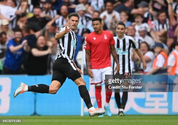 Fabian Schar of Newcastle United celebrates scoring their side's first goal during the Premier League match between Newcastle United and Nottingham...
