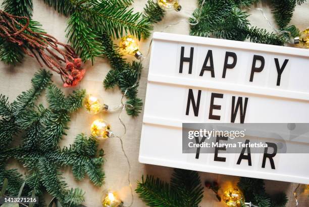 lightbox with inscription happy new year. christmas. festive background. - new years eve 2020 stock pictures, royalty-free photos & images