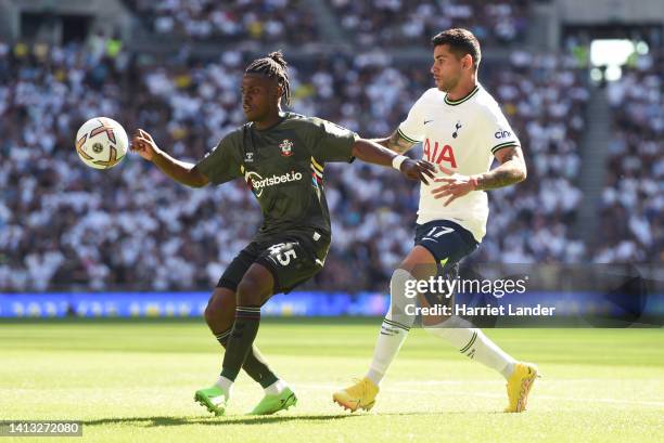 Romeo Lavia of Southampton is marked by Cristian Romero of Tottenham Hotspur during the Premier League match between Tottenham Hotspur and...
