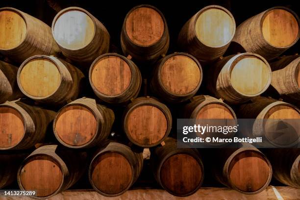 barrels in a wine cellar - cellar stock pictures, royalty-free photos & images
