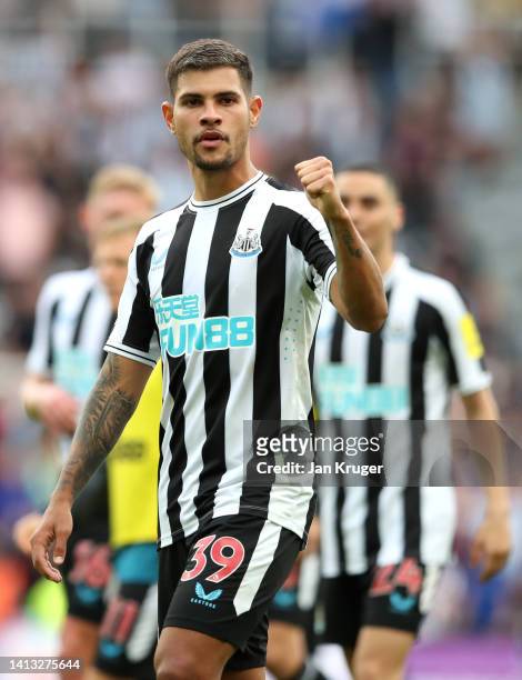 Bruno Guimaraes of Newcastle United celebrates after the final whistle of the Premier League match between Newcastle United and Nottingham Forest at...