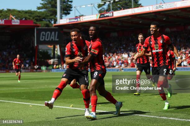 Jefferson Lerma of AFC Bournemouth celebrates their side's first goal with teammate Marcus Tavernier during the Premier League match between AFC...
