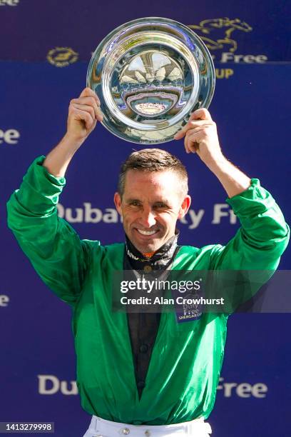Neill Callan with the trophy for being top rider of the day during The Shergar Cup at Ascot Racecourse on August 06, 2022 in Ascot, England.