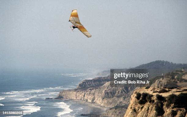 Hang glider soars over the Pacific Ocean, July 16, 1985 at Torrey Pines, near La Jolla, California.