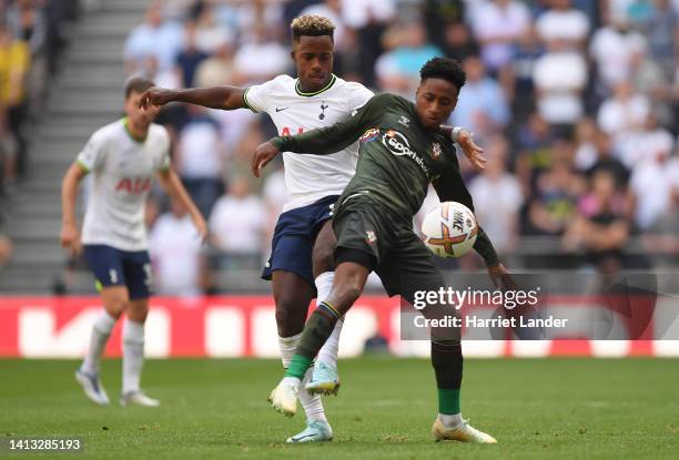 Kyle Walker-Peters of Southampton battles for possession with Ryan Sessegnon of Tottenham Hotspur during the Premier League match between Tottenham...