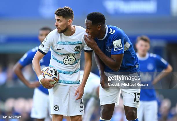 Jorginho of Chelsea speaks with Yerry Mina of Everton during the Premier League match between Everton FC and Chelsea FC at Goodison Park on August...