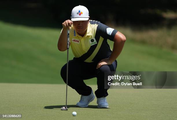 Sungjae Im of Korea prepares to putt on the first green during the third round of the Wyndham Championship at Sedgefield Country Club on August 06,...