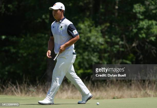 Joohyung Kim of Korea walks on the first green during the third round of the Wyndham Championship at Sedgefield Country Club on August 06, 2022 in...